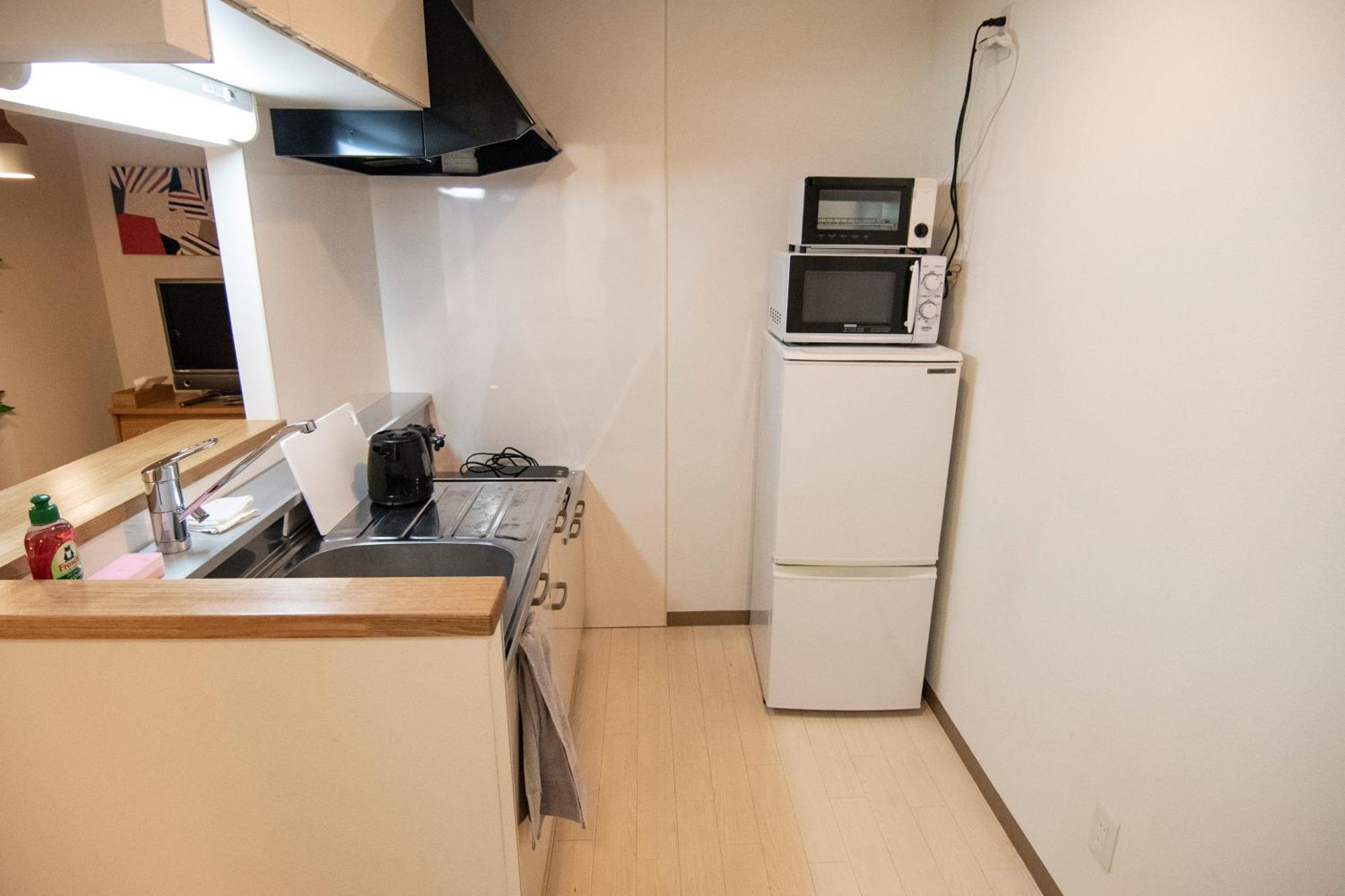 Tsubaki Garden Apartment Sapporo Phòng bức ảnh